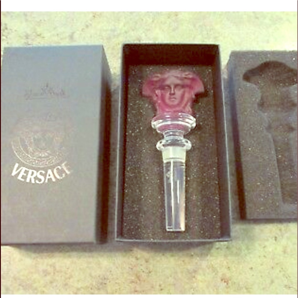 Versace wine stopper, in box.